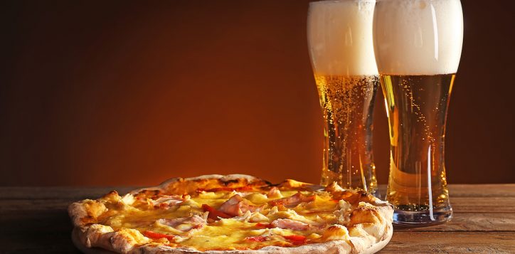 tastypizzawithbeeronwoodentable-2